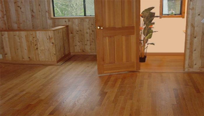 Solid red oak flooring throughout this California country home enhances its relaxing rural ambience.